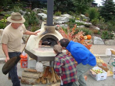 Earth Ovens, Heirloom Tomato Tasting, and Milking Practice – Oh My! Image